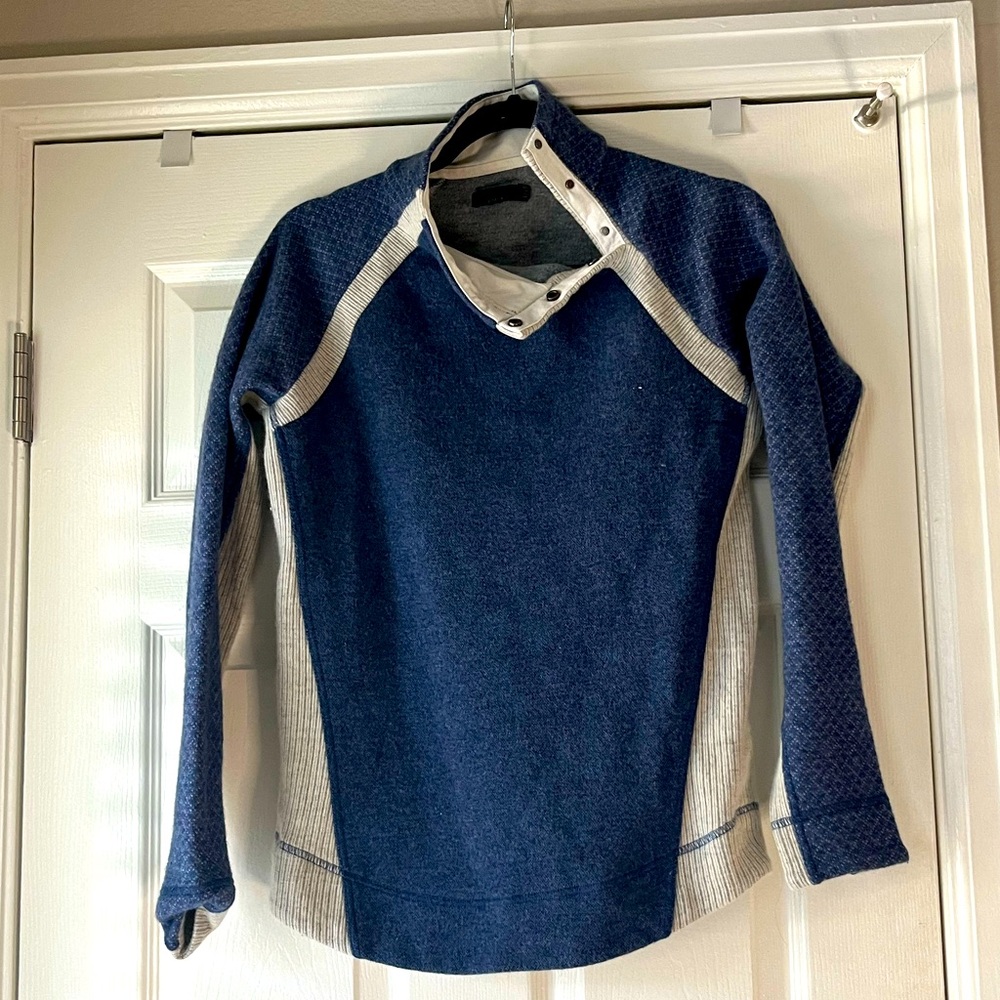 Warm blue Prana sweater with snap asymmetrical neck. Size small.